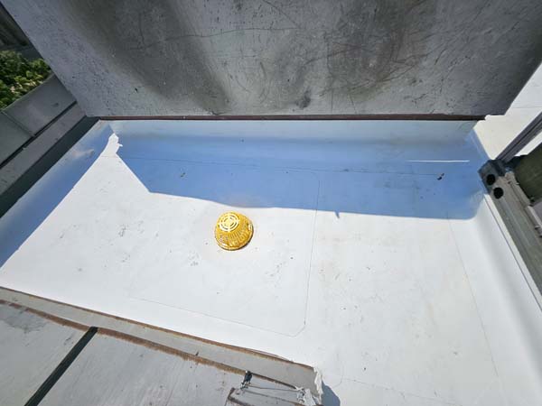 Completed rebuilt roof drain assembly with new TPO flashing at 633 Pennsylvania Ave NW
