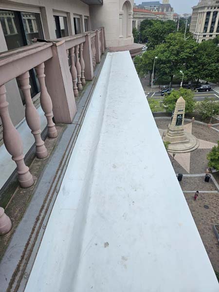 Completed Elevate TPO membrane on an eyebrow roof section at 633 Pennsylvania Ave NW