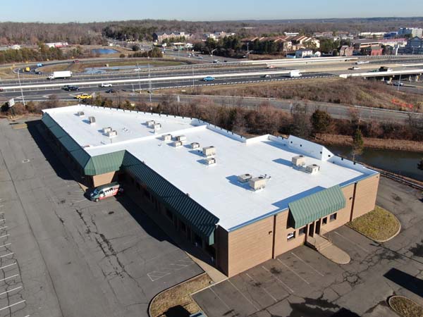 New Elevate UltraPly 60-mil TPO membrane installed at 7171 New Market Ct in Manassas, Virginia