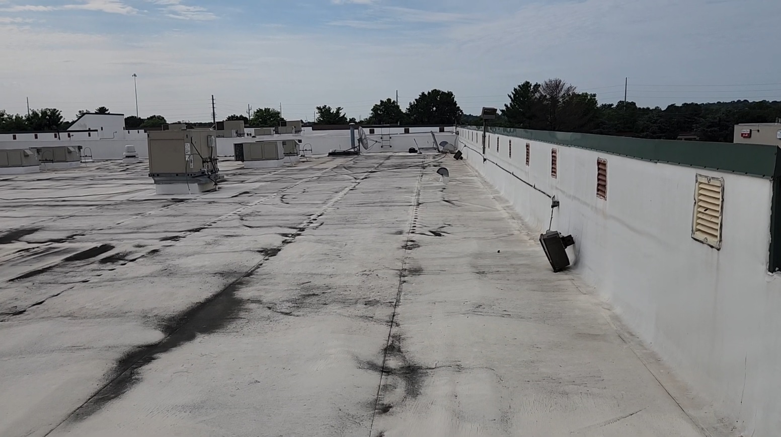 Failing Duro-Last roof membrane at 7171 New Market Ct before replacement