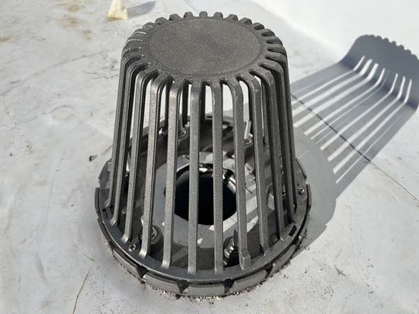 Rebuilt roof drain with new clamping ring flashed into the Elevate TPO membrane at 7171 New Market Ct