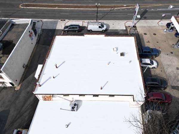 Aerial view of the white silicone-coated roof on the warehouse at 2330 Columbia Pike, Arlington, VA